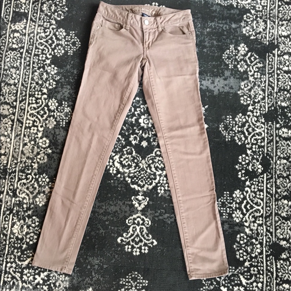 American Eagle • Khaki/Camel Skinny Jeans